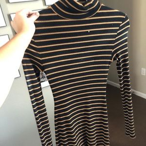 Black and orange striped turtleneck sweater dress